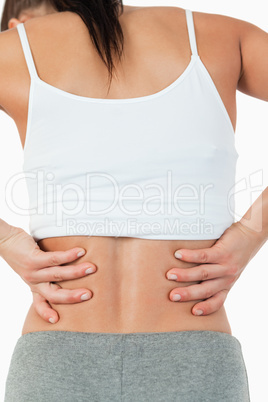 Back view of female with back pain