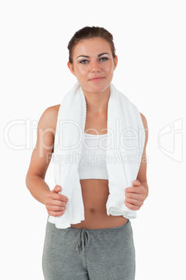 Young woman with towel around her neck