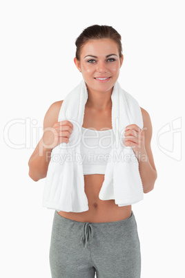 Sportswoman with towel around her neck