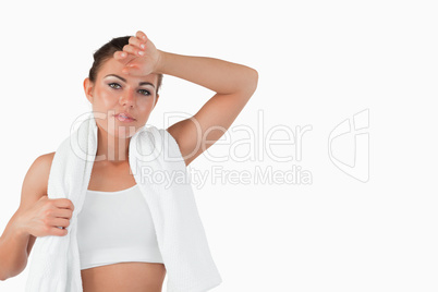 Sportswoman wiping off sweat