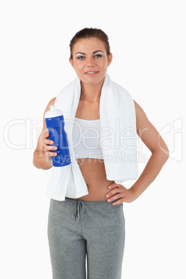 Sportswoman with bottle