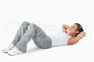 Young female doing sit ups