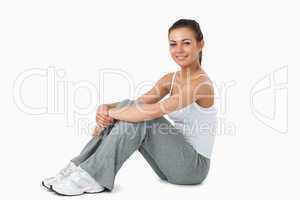 Young female sitting on the floor