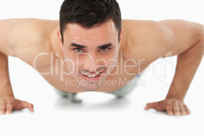 Young man doing push ups