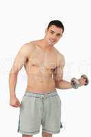Young man doing weight lifting