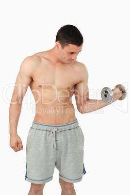 Sportsman lifting weights
