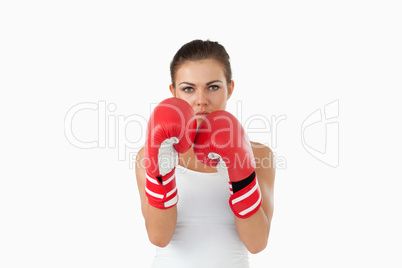 Female boxer in defensive stance