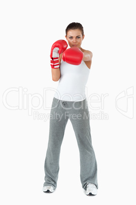 Female boxer striking with her left