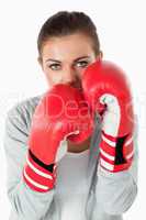 Portrait of a woman with boxing gloves