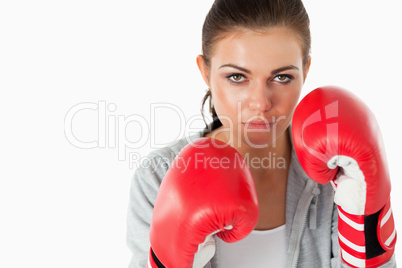Young woman with boxing gloves