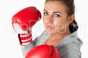 Cute woman with boxing gloves