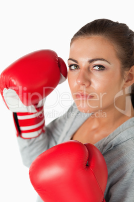 Portrait of a cute woman with boxing gloves