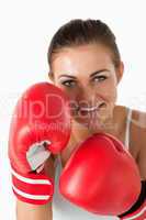 Portrait of a beautiful woman with boxing gloves