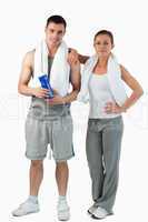Portrait of a young couple going to practice sport