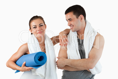 Cute couple going to practice yoga
