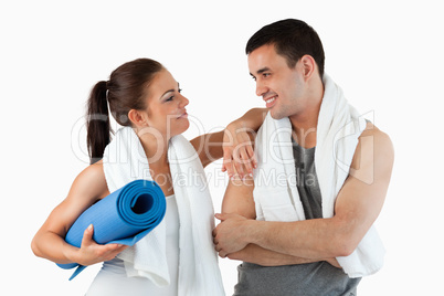 Healthy couple going to practice yoga