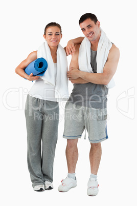 Portrait of a couple going to practice yoga