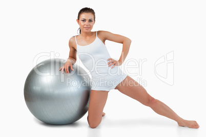 Woman working out with a ball