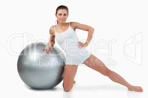 Woman working out with a ball