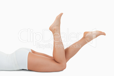 Feminine body lying on her belly
