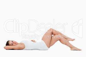 Gorgeous woman lying on the floor