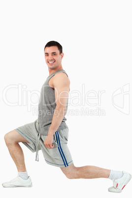 Portrait of a man stretching his legs