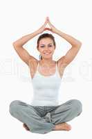 Portrait of a woman in a meditation position