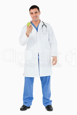 Portrait of a doctor with an apple