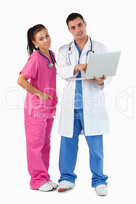 Portrait of doctors using a laptop