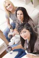 Interracial Group Three Women Friends Drinking Wine Together at