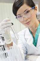 Chinese Female Woman Scientist With Test Tube In Laboratory