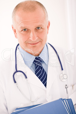 Mature doctor male portrait with folders