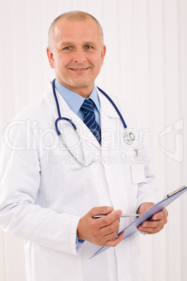 Mature doctor male portrait write document