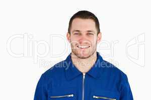 Smiling young blue collar worker