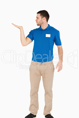 Young salesman presenting in his palm