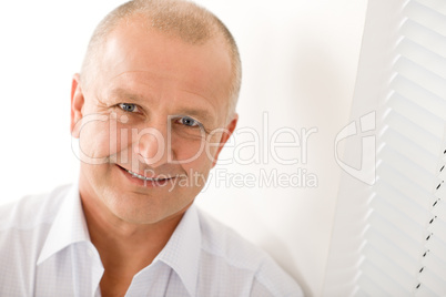 Mature businessman smile posing close-up portrait Mature businessman smile posing close-up portrait