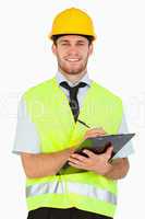 Smiling young foreman with his clipboard