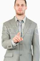 Finger of businessman pointing