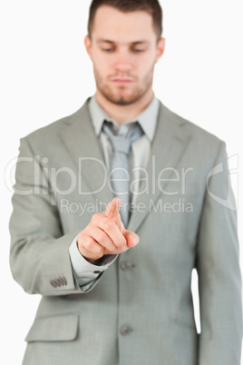 Businessman using futuristic touchscreen