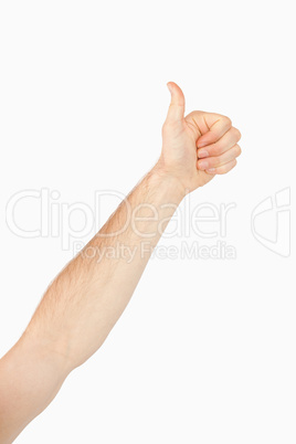 Side view of left arm giving thumb up