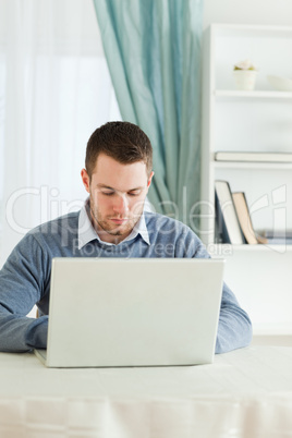 Businessman working concentrated in his homeoffice