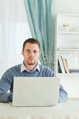 Businessman sitting in his homeoffice