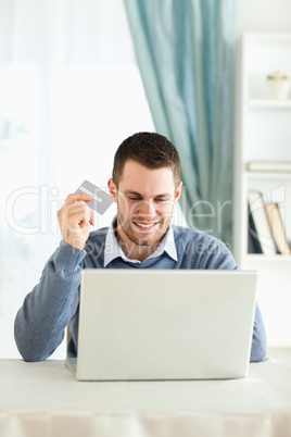 Male happy about online shopping