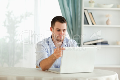 Businessman looking at his notebook