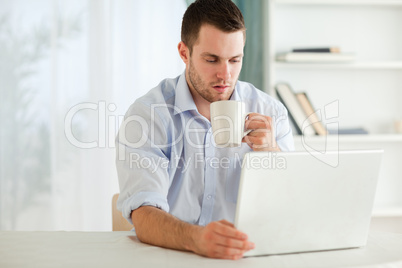 Businessman having a cup of tea