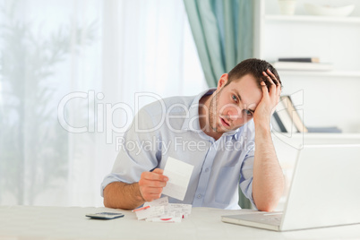 Businessman worried about an invoice