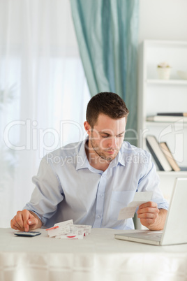 Businessman doing his calculations