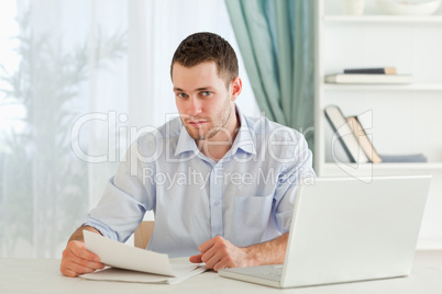 Businessman reading a letter