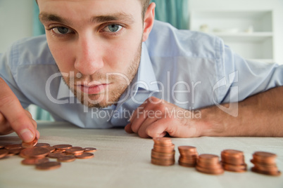 Businessman counting his change