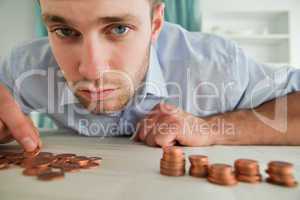 Businessman counting his change